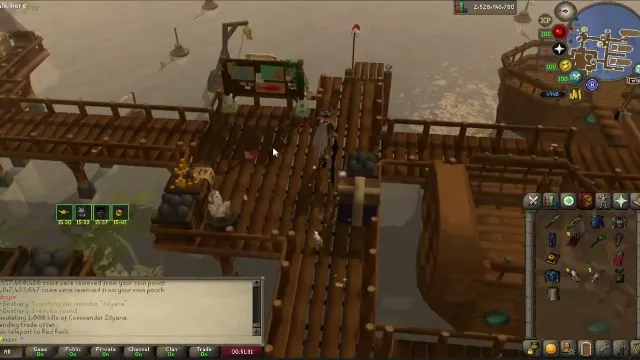 Wooden harbour docks with a moored ship